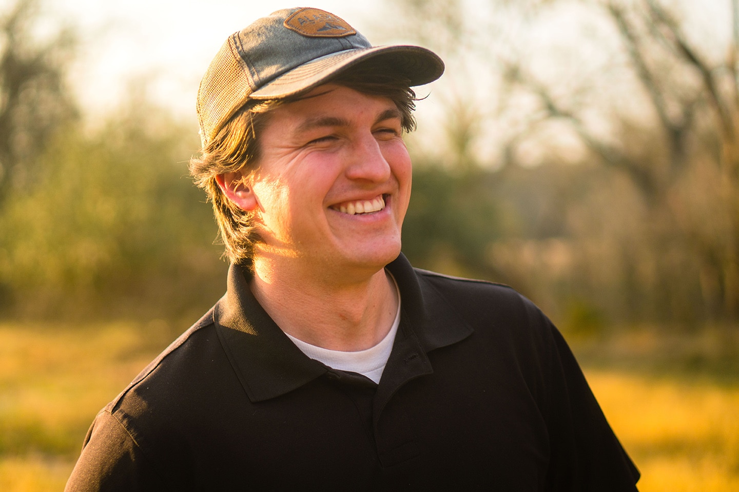 man laughing after a root canal procedure in baton rouge louisiana