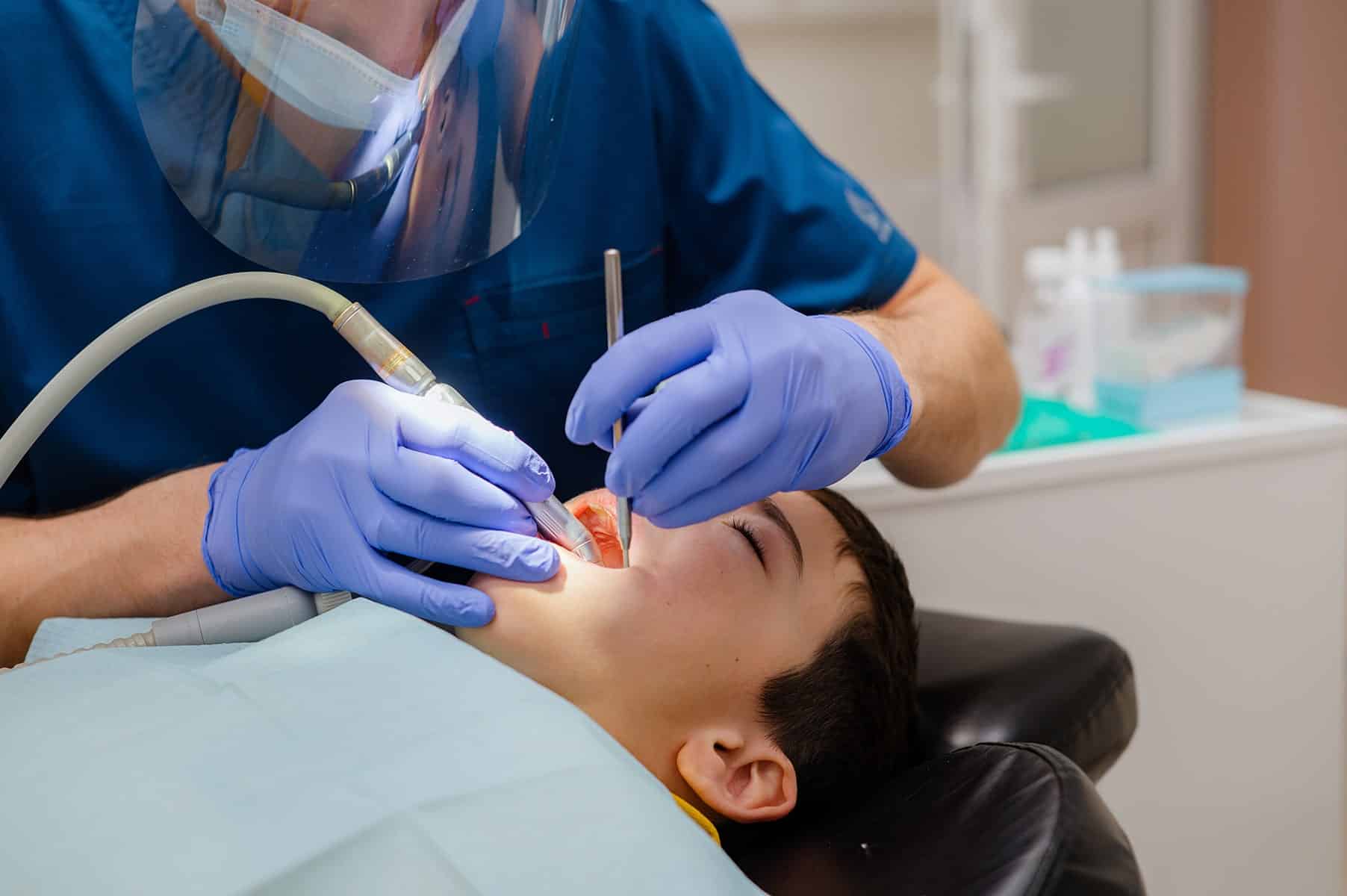 Boy getting sedation dental care in Baton Rouge, LA