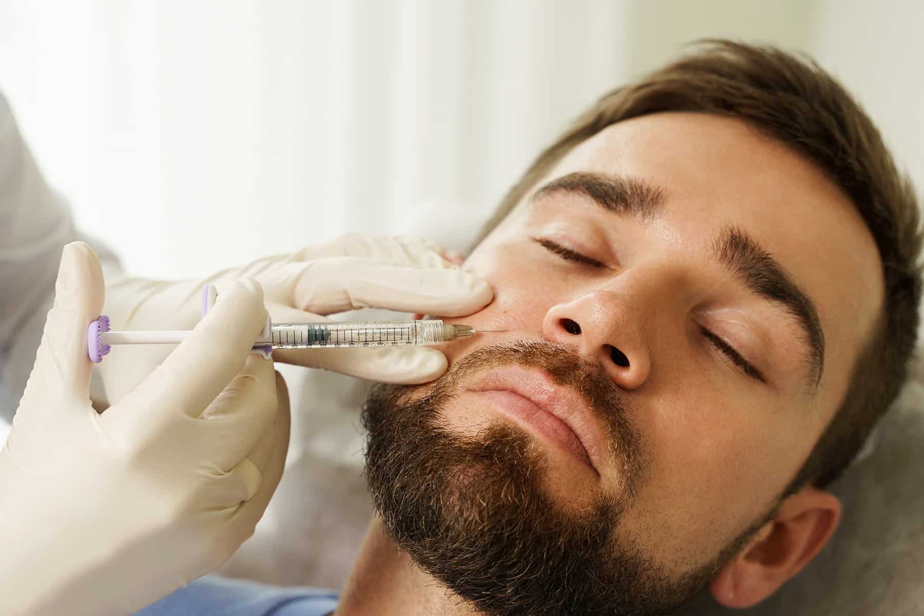 Man getting facial filler in Baton Rouge, LA